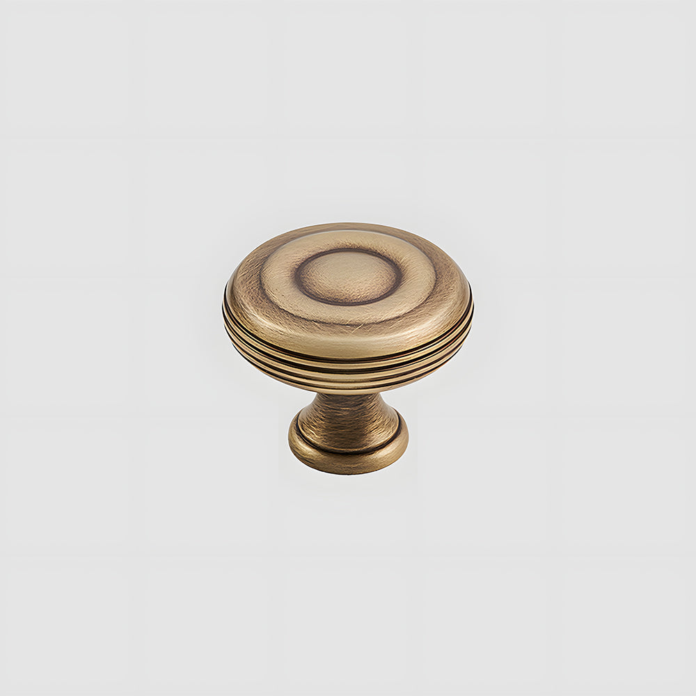 Bronze brass vintage cabinet pull and round knob, pictured in one view on a clean neutral background