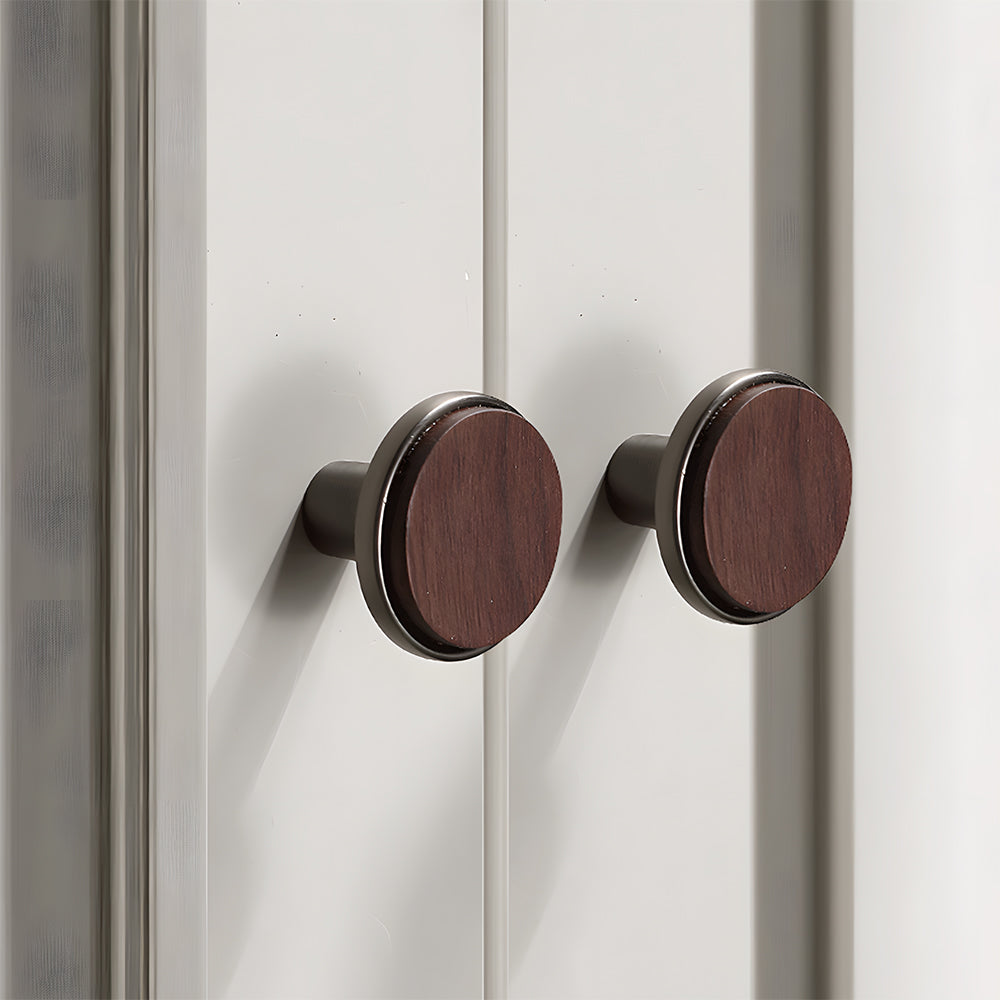 Walnut inlay cabinet knob with a silver-toned frame, shown from a side angle on a light background