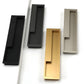 Slotted Recessed Cabinet Pulls in Gold, Black, and Gray