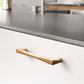 Gold Arched Cabinet Handles and Round Knobs
