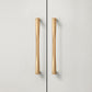 Gold Arched Cabinet Handles and Round Knobs