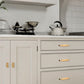 Ribbed Brass Cabinet Handles and Matching Knobs