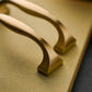 Wide Arched Brass Cabinet Pulls and Drawer Handles