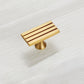 Ribbed Brass Cabinet Handles and Matching Knobs