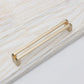 Open-Center Cabinet Pulls and Matching Knobs