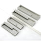 Slotted Recessed Cabinet Pulls in Gold, Black, and Gray