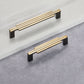 Ribbed Brass Cabinet Handles and Matching Knobs