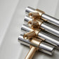 Two-Tone Round Bar Cabinet Handles with Brass Feet