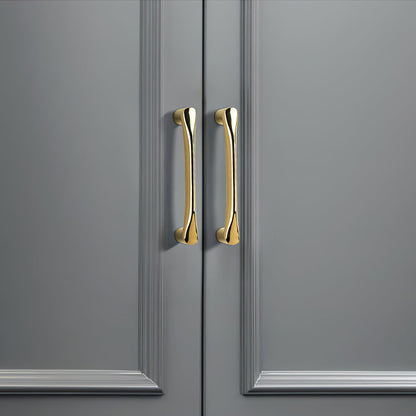 Curved Brass Cabinet Pulls in Gold and Black