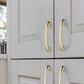 Modern Curved Cabinet Handles and Round Knobs