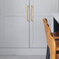 Gold Arched Cabinet Handles and Round Knobs
