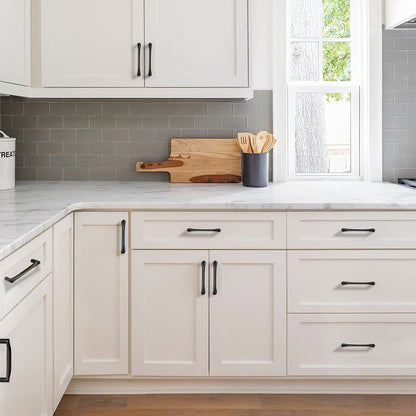 Curved Brass Cabinet Pulls in Gold and Black