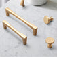 Gold Arched Cabinet Handles and Round Knobs