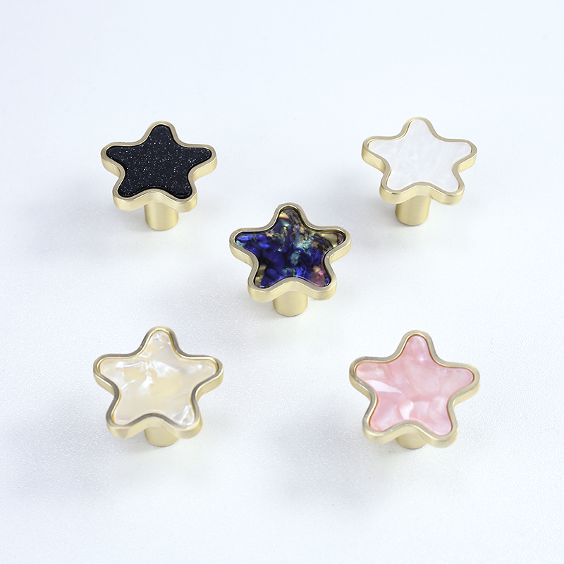 Star-Shaped Gold-Tone Drawer Knobs with Colored Insets