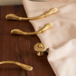 Brass Shell Cabinet Pulls and Round Knobs