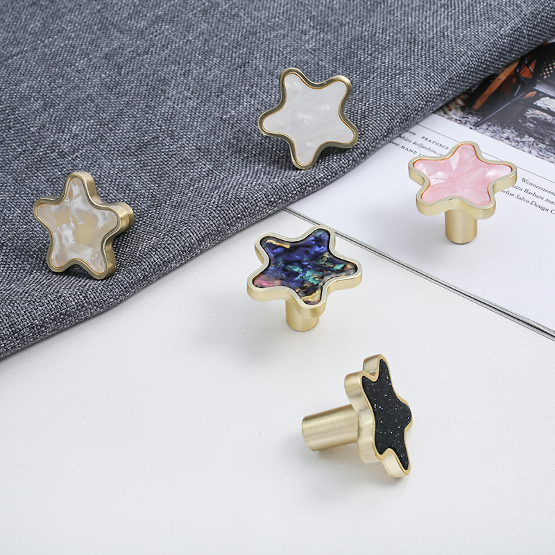 Star-Shaped Gold-Tone Drawer Knobs with Colored Insets