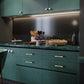 Gold Arched Cabinet Handles and Round Knobs