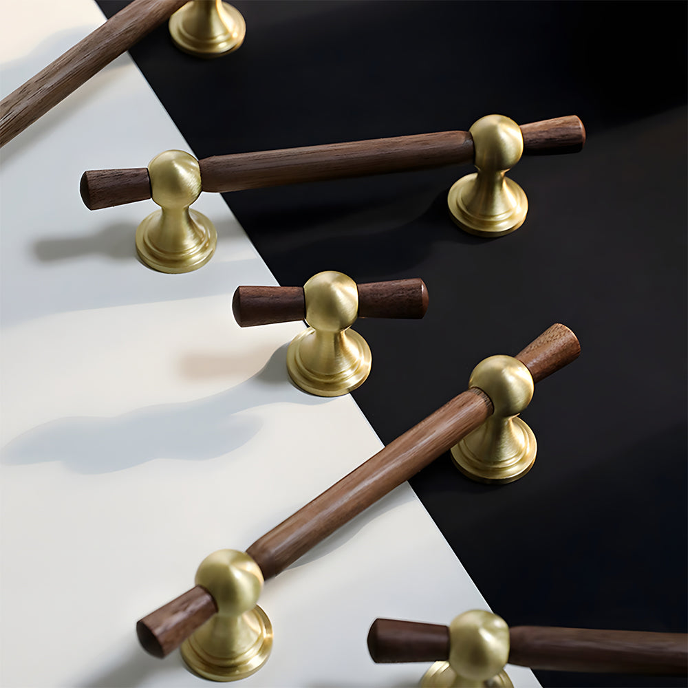 Wood T-bar cabinet pull with round metal pedestal mounts, shown from one angle as a color and finish lineup