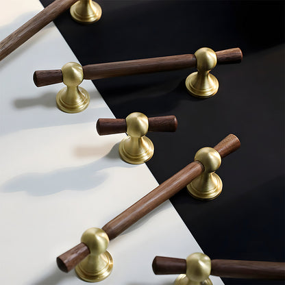 Wood T-bar cabinet pull with round metal pedestal mounts, shown from one angle as a color and finish lineup