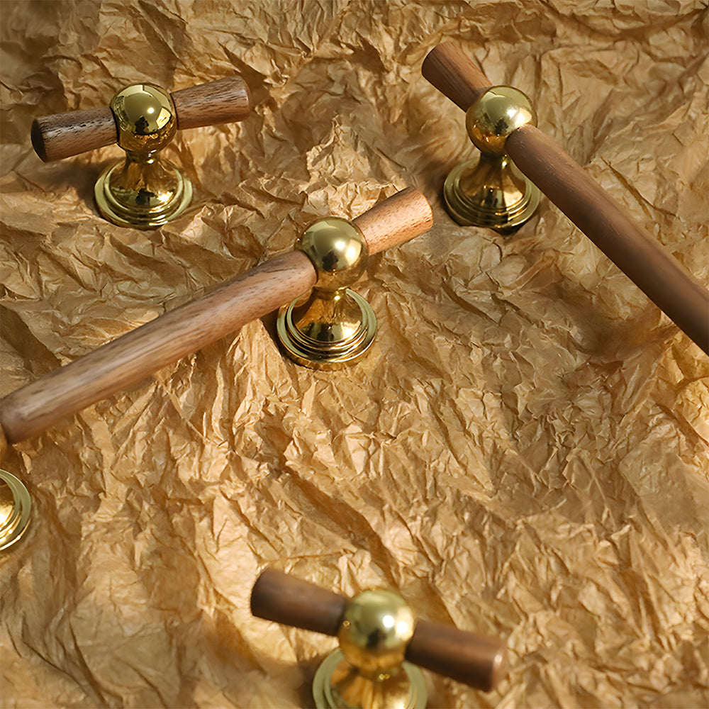 Wood T-bar cabinet pull with round metal pedestal mounts, presented for reference as a color and finish lineup