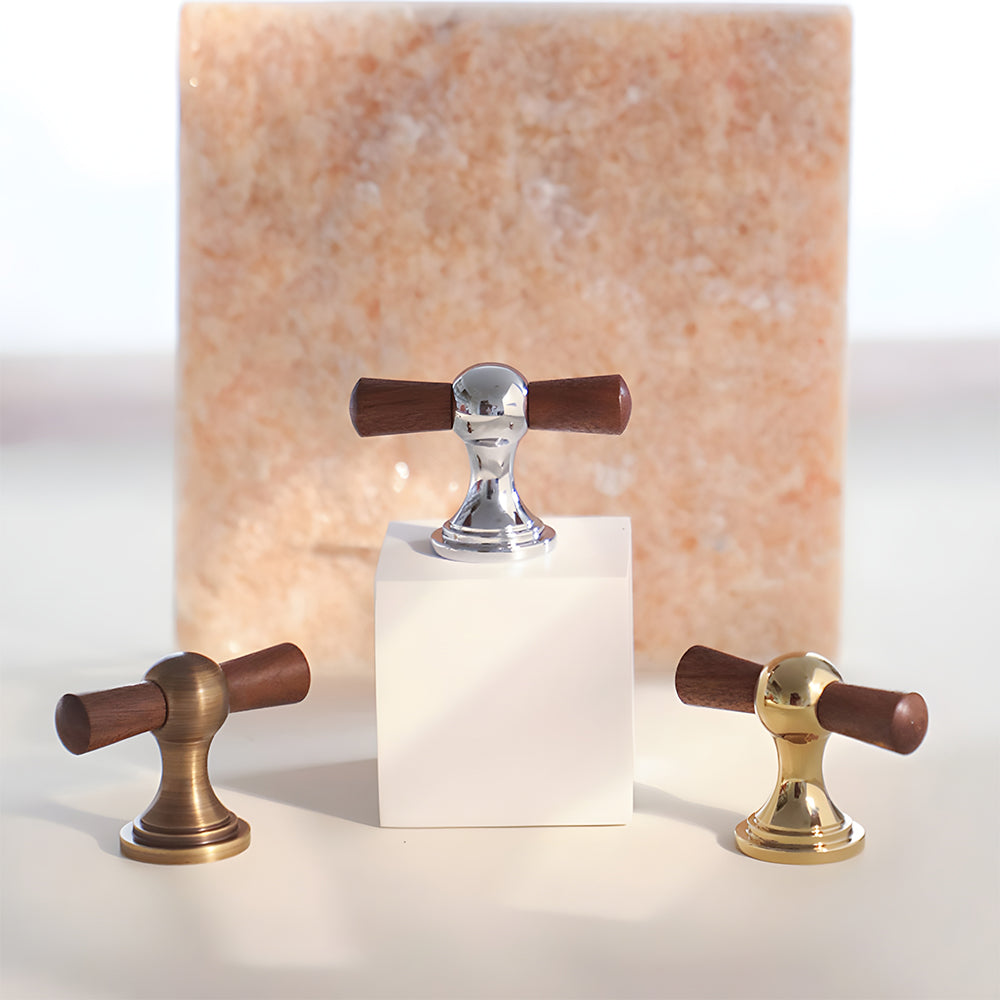 Wood T-bar cabinet pull with round metal pedestal mounts, shown at close range as a color and finish lineup