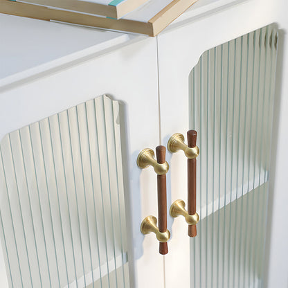 Wood T-bar cabinet pull with round metal pedestal mounts, shown clearly installed on cabinetry in context