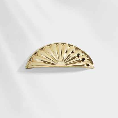 Shell-shaped cabinet cup pull, pictured in one view on a clean neutral background