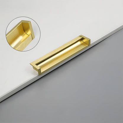 Gold recessed aluminum finger edge pull, shown from one angle with its construction and finish visible