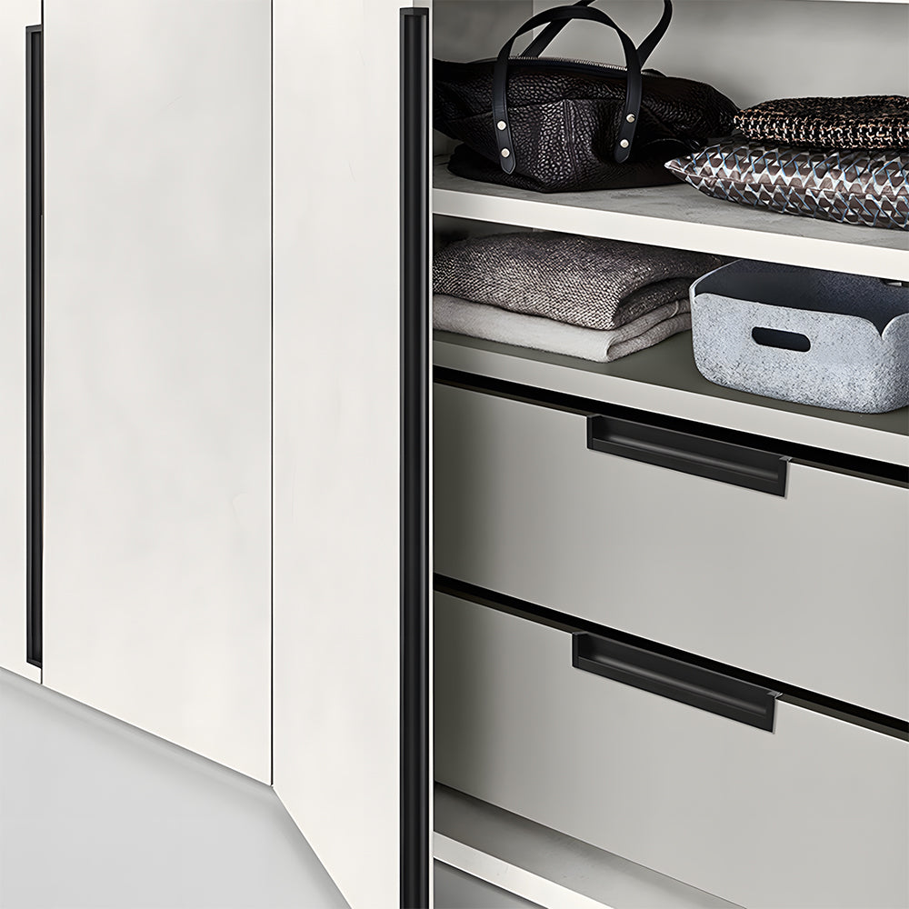 Black recessed aluminum finger edge pull, shown in a focused view installed on cabinetry in context
