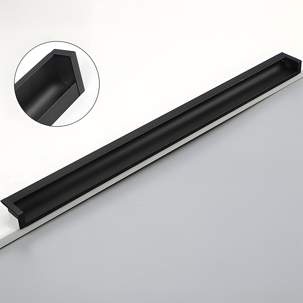 Recessed aluminum finger edge pull, shown from one angle showing the surface and mounting form