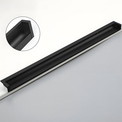 Recessed aluminum finger edge pull, shown from one angle showing the surface and mounting form