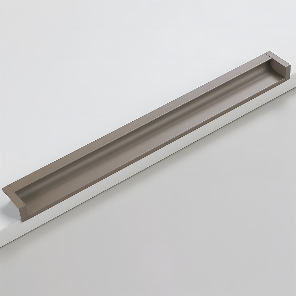 Coffee recessed aluminum finger edge pull, displayed from the side on a clean neutral background