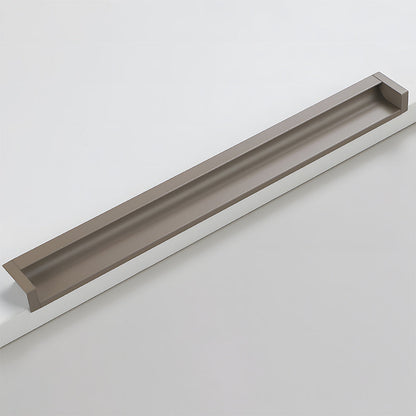 Coffee recessed aluminum finger edge pull, displayed from the side on a clean neutral background