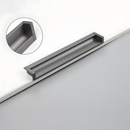 Gray recessed aluminum finger edge pull, shown at close range showing the surface and mounting form