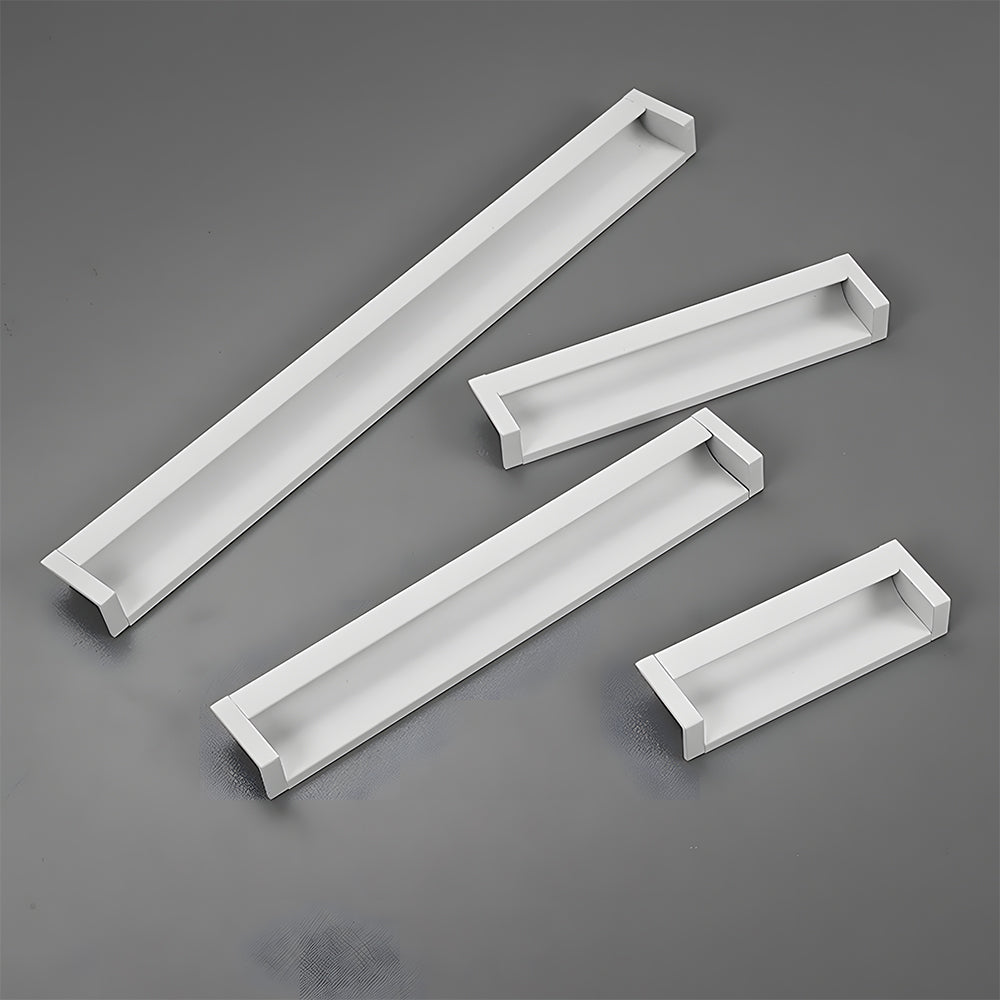 White recessed aluminum finger edge pull, displayed from the side as a color and finish lineup