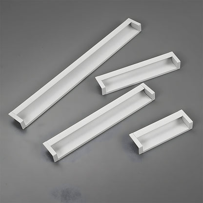 White recessed aluminum finger edge pull, displayed from the side as a color and finish lineup