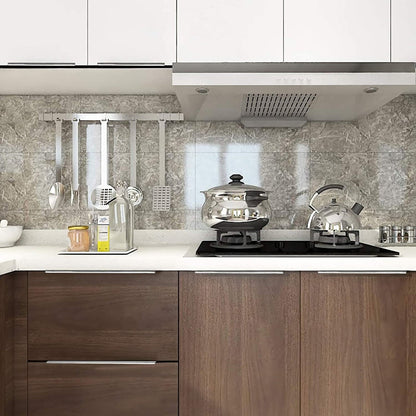Silver square aluminum cabinet edge pull, shown from one angle mounted on a finished cabinet front