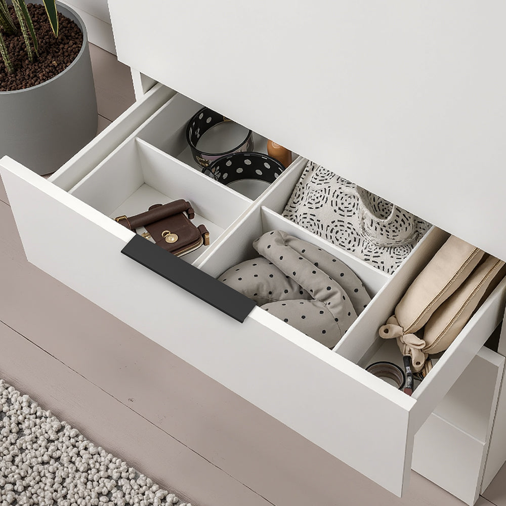 Black square aluminum cabinet edge pull, presented for reference installed on cabinetry in context