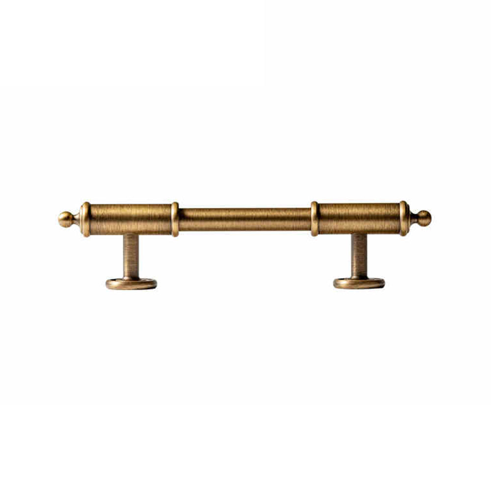 Antique brass round bar cabinet pull with matching T-knob, presented in another view on a clean neutral background