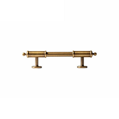 Antique brass round bar cabinet pull with matching T-knob, shown clearly with its shape and finish visible