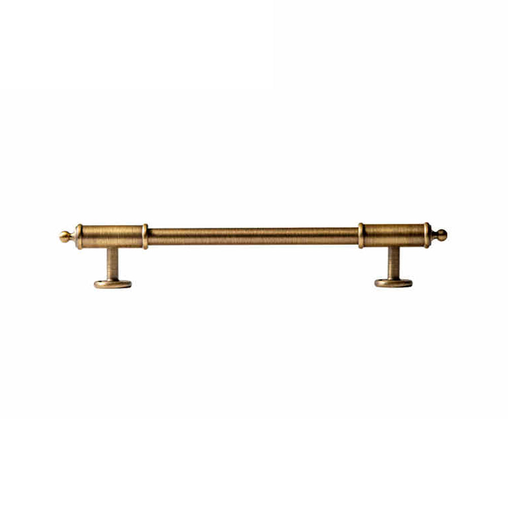 Antique brass round bar cabinet pull with matching T-knob, pictured in one view with its shape and finish visible