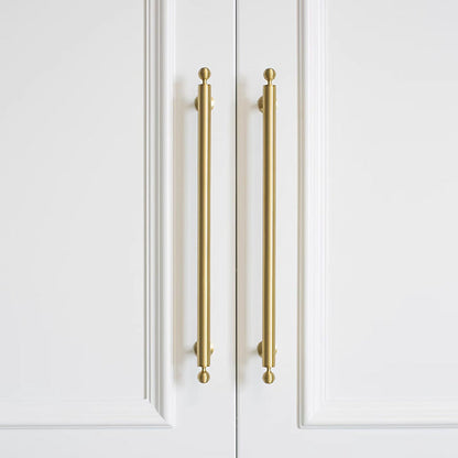 Antique bronze cabinet pull with matching ribbed knob, displayed from the side in an installed cabinet close-up