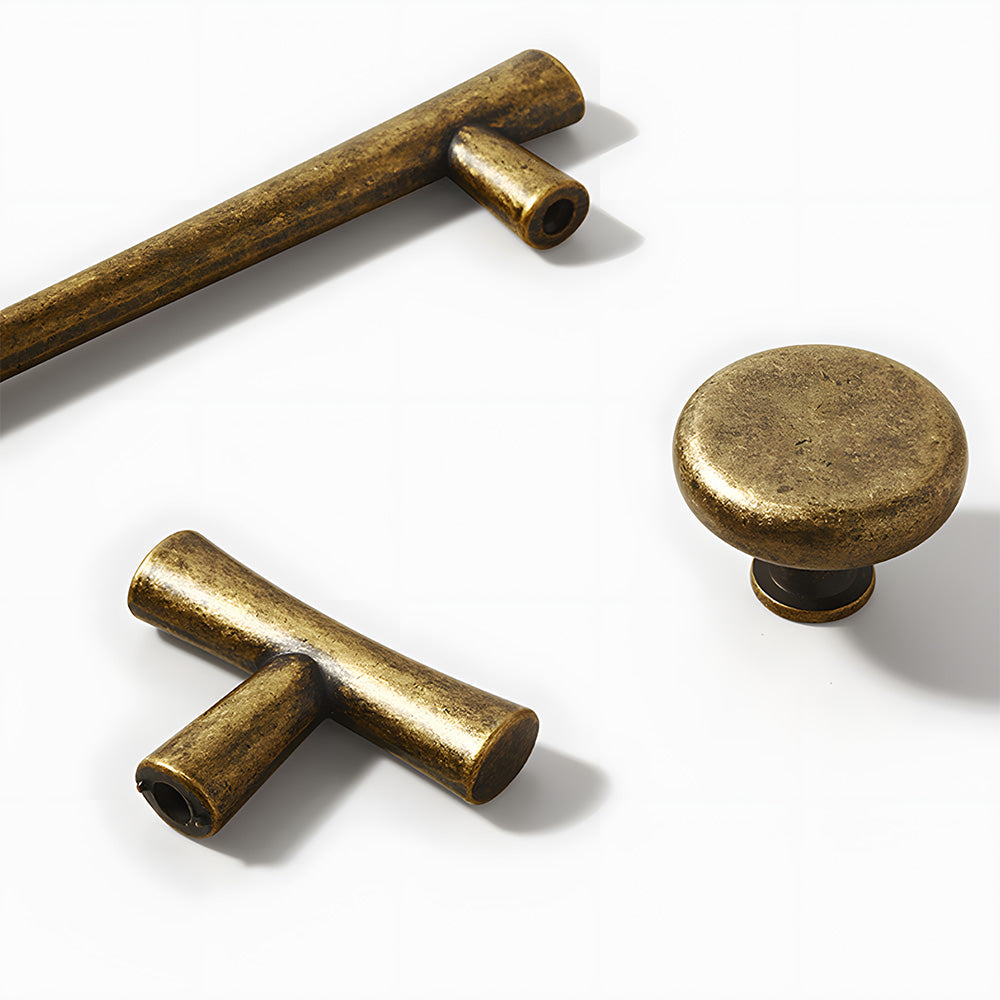 Antique bronze tapered bar cabinet pull and knobs, presented for reference with related hardware in one display