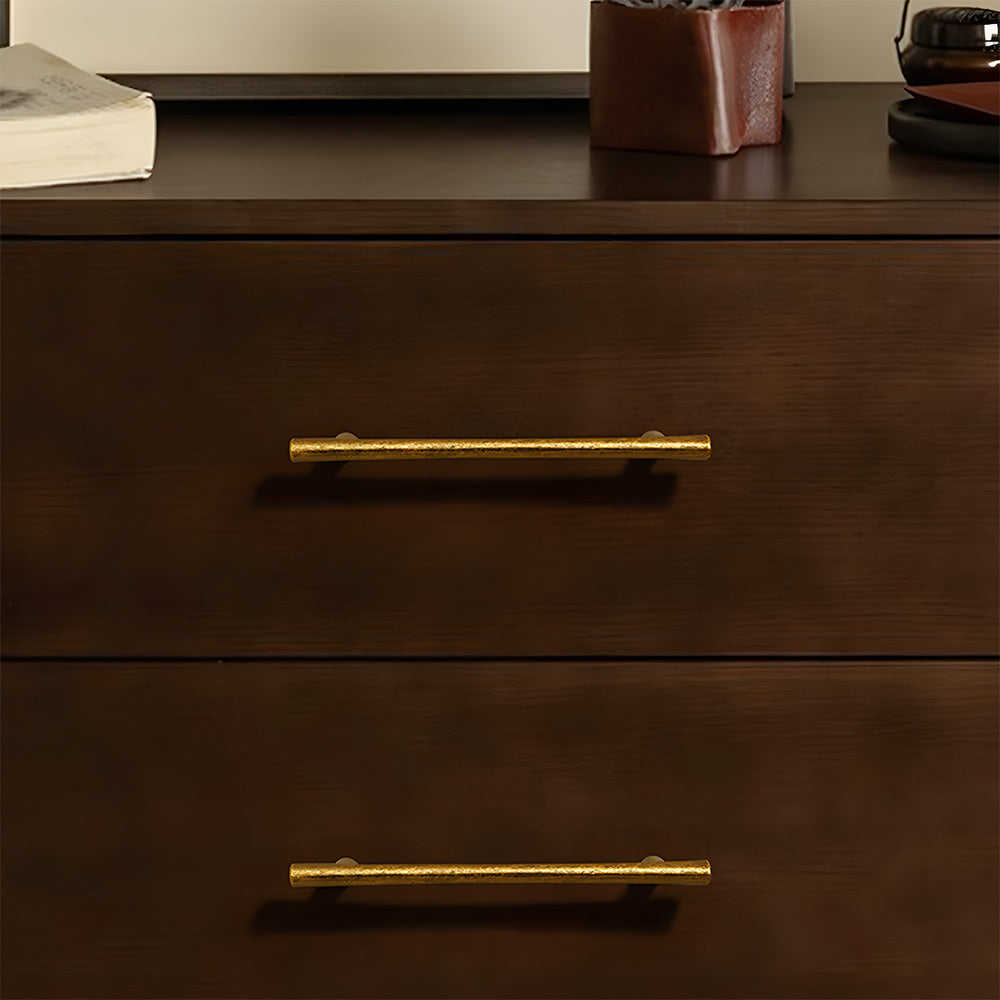 Antique bronze tapered bar cabinet pull and knobs, shown from one angle installed on cabinetry in context