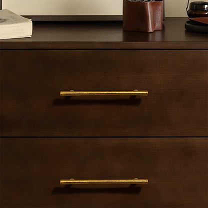 Antique bronze tapered bar cabinet pull and knobs, shown from one angle installed on cabinetry in context