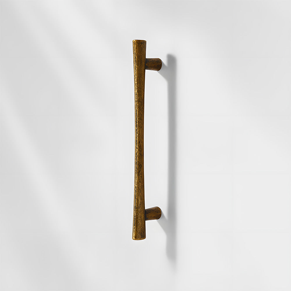 Antique bronze tapered bar cabinet pull and knobs, shown from one angle on a clean neutral background