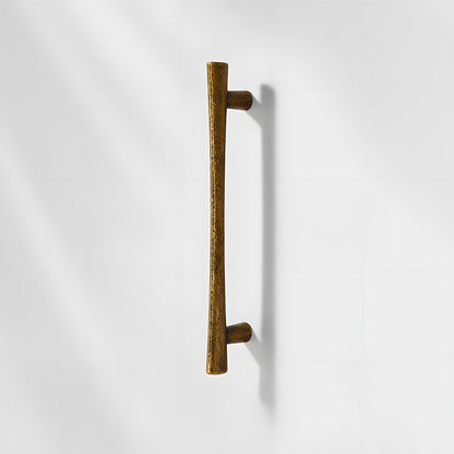 Antique bronze tapered bar cabinet pull and knobs, shown from one angle on a clean neutral background