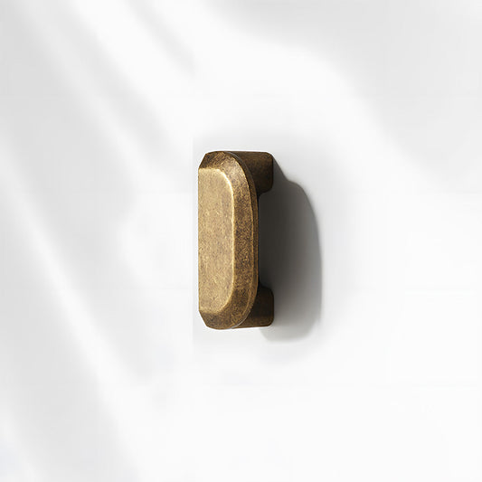 Antique bronze recessed cabinet pull, pictured in one view on a clean neutral background