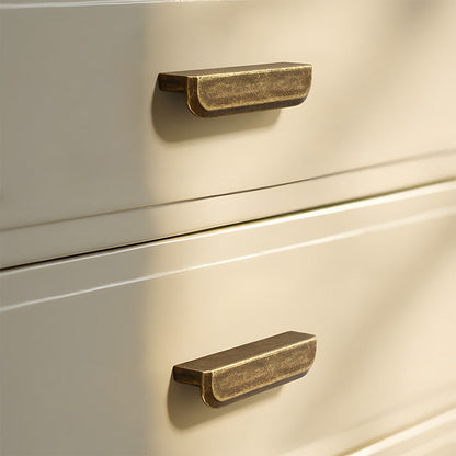 Antique bronze recessed cabinet pull, pictured in one view installed on cabinetry in context