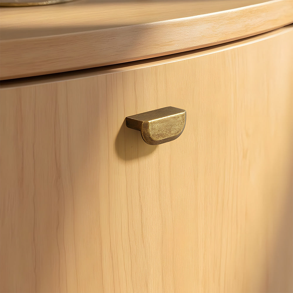 Antique bronze recessed cabinet pull, shown clearly in an installed cabinet close-up